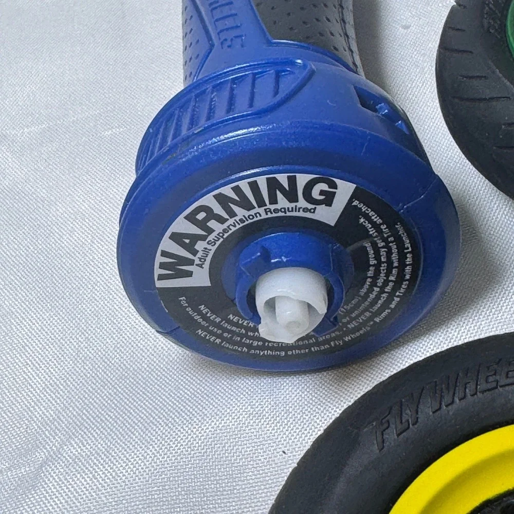 Jakks Pacific Fly Wheels Launcher Lot w/ 5 Performance Stunt Tires and Rip Cord